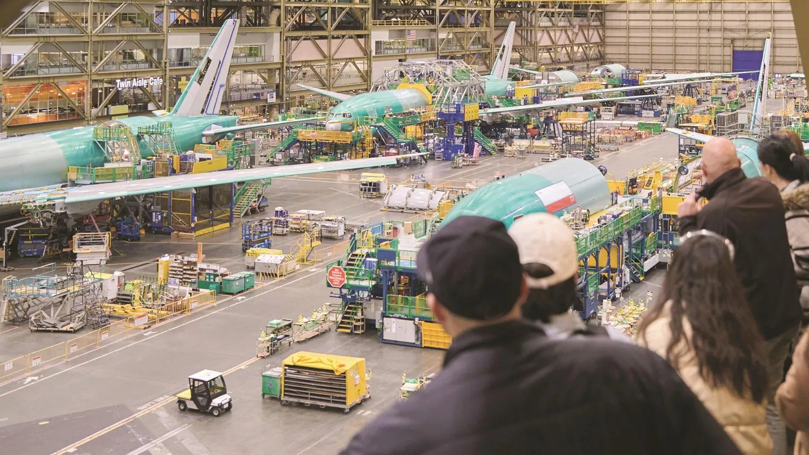 Tour visitors look down over the Everett assembly floor from the Strato Deck viewing platform