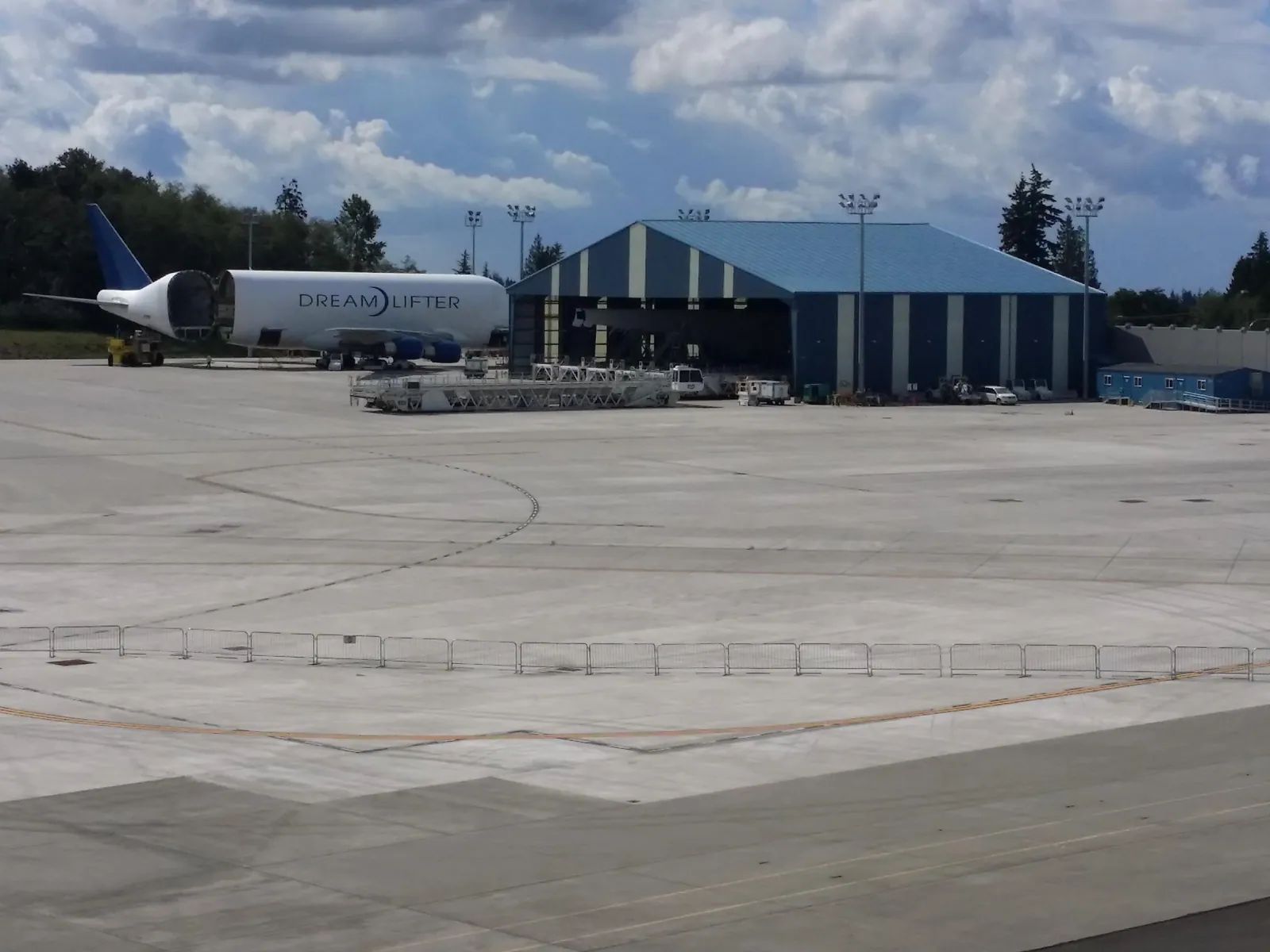 A Boeing Dreamlifter cargo freighter parked on the ramp at Paine Field